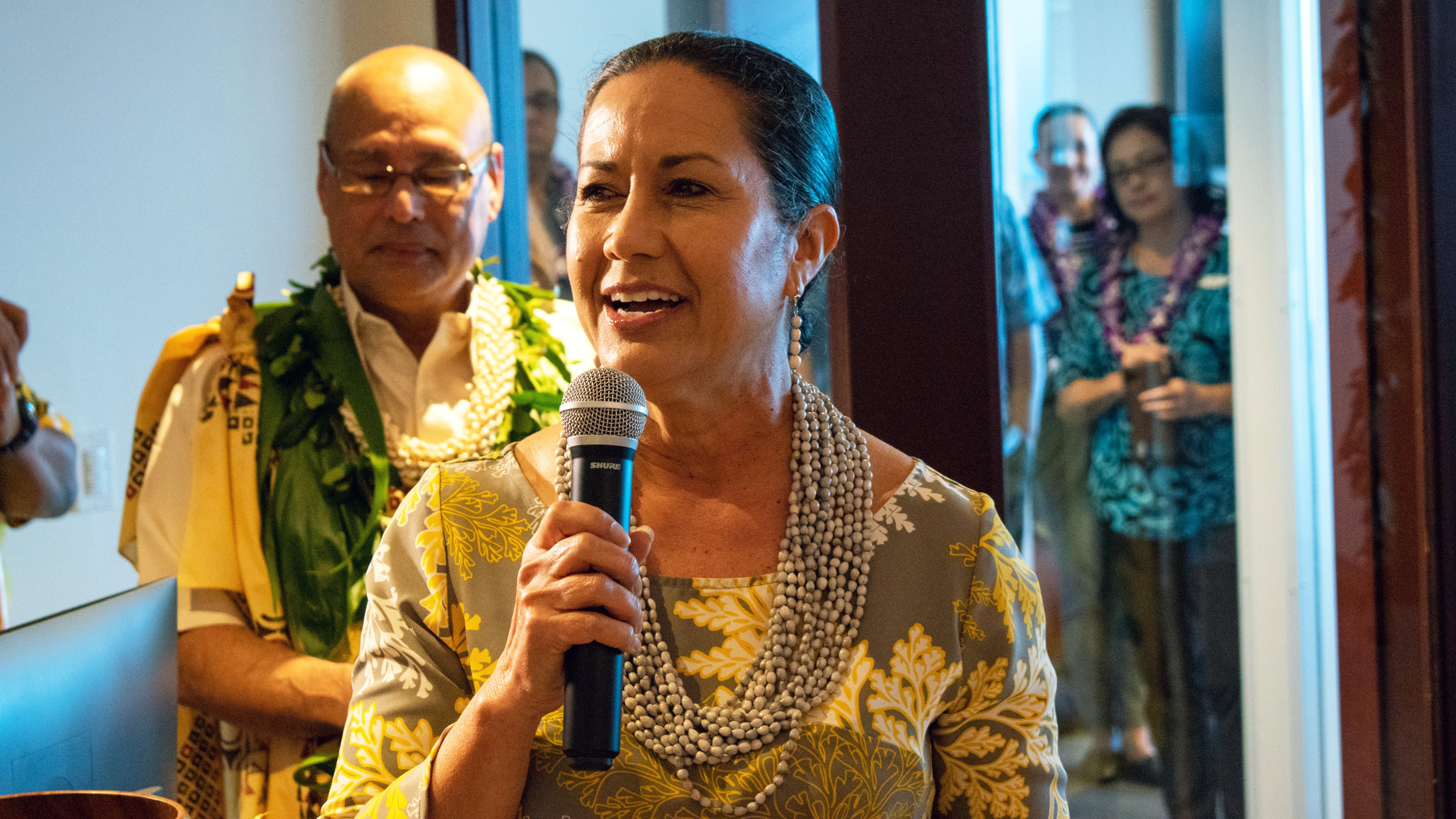 Debbie Nakanelua-Richards, director of government and community relations at Hawaiian Airlines, sang a traditional Hawaiian song during the blessing ceremony. (Graham Bosch/Chamber Business News)